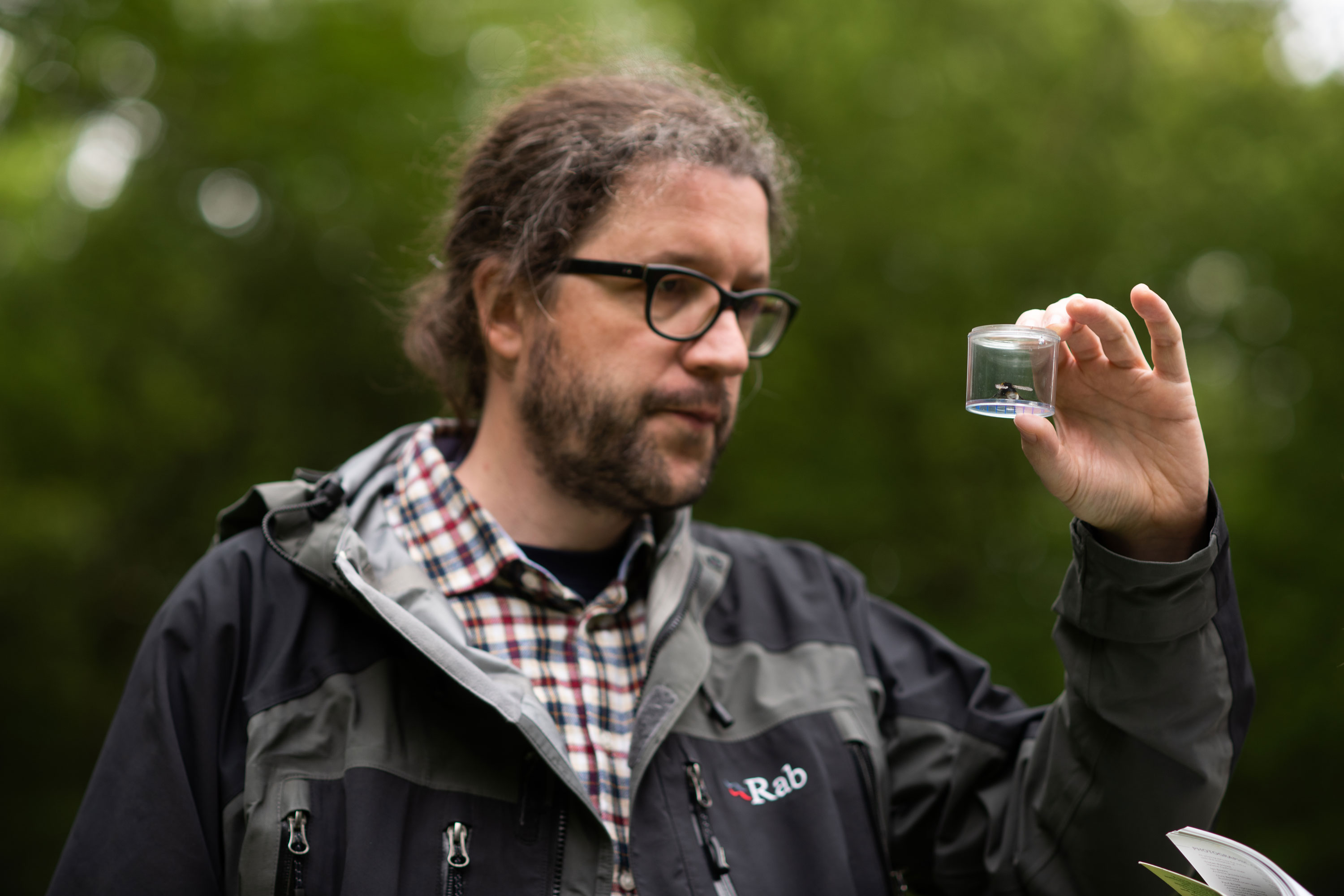 The Prince of Wales&rsquo;s Charitable Fund Fellow Dr Matthias Becher holding a tiny pollinator tracker &lsquo;backpack&rsquo;. Photographer: John Cairns