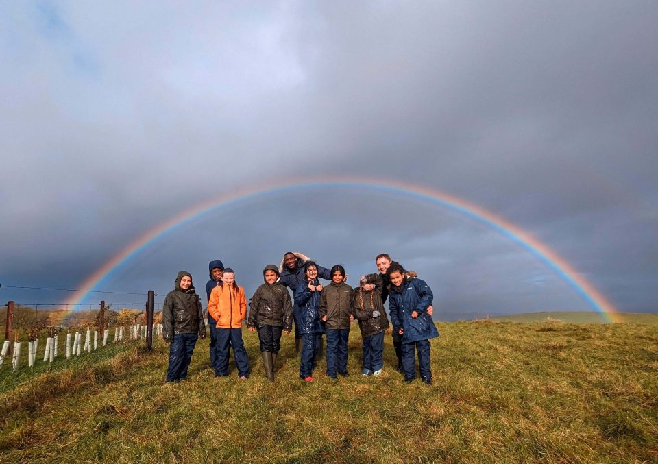 Young people and rainbow